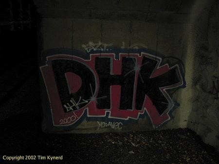 Hallonbergen, graffiti behind gate