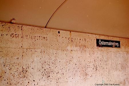 Östermalmstorg, platform wall with sign