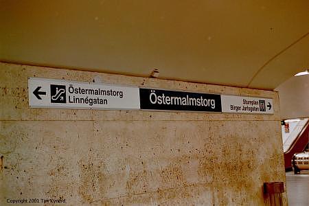 Östermalmstorg, sign on platform wall with exits