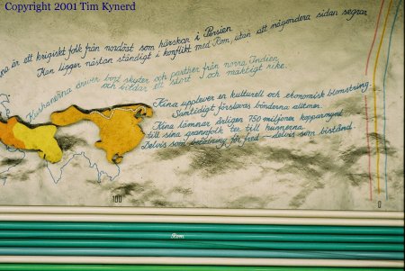 Rissne, southbound track wall with text about China and map