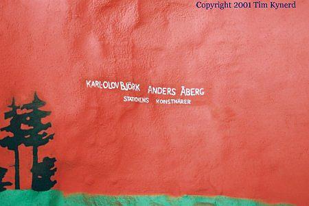 Solna centrum, cadmium red wall with artists' names